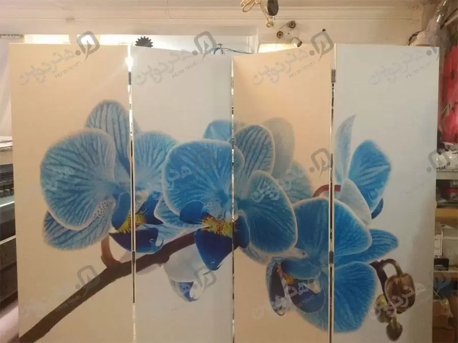 نمونه چاپ با دستگاه هنر نوین چاپ روی mdf طرح گل با رنگ آبی